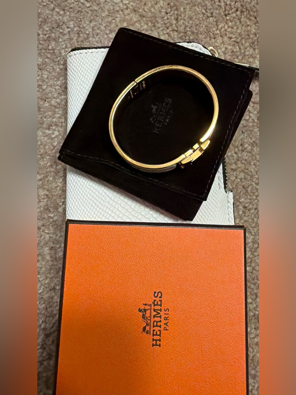Hermès Clic H bracelet white and yellow gold-plated